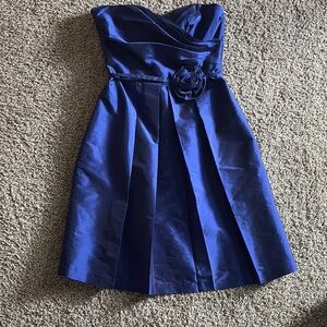 Elegant Blue Strapless Dress with Floral Accent